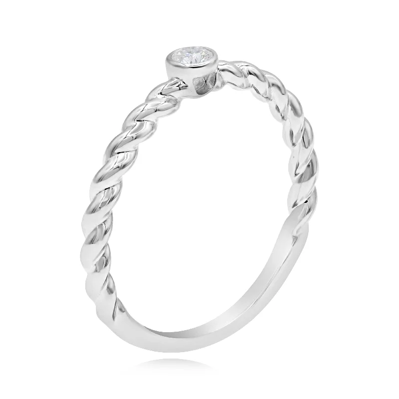 0.10ct Diamond Ring set in 14KT White Gold / RL259E